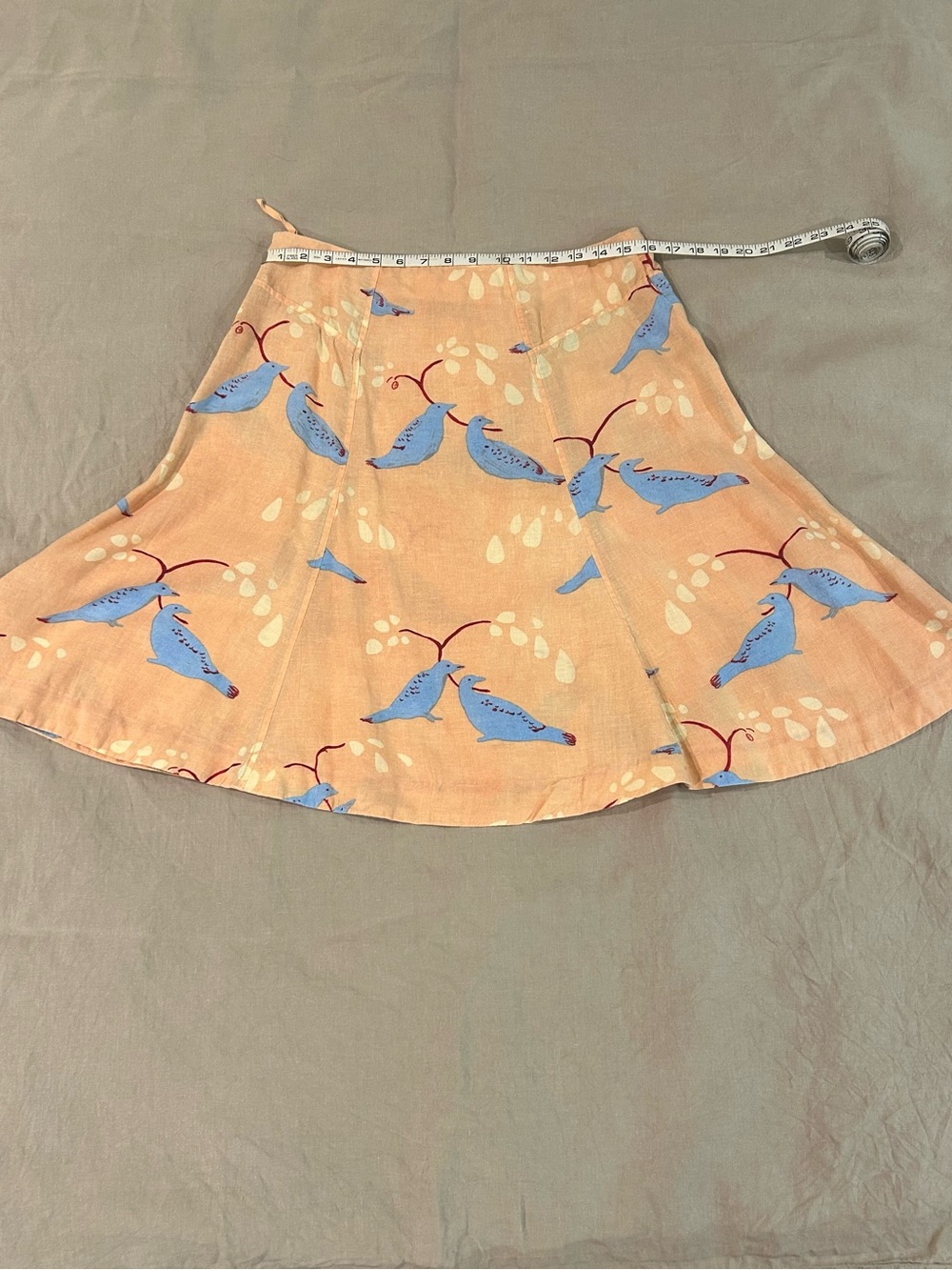 Anthropologie Peach Skater Skirt with Blue Bird Print